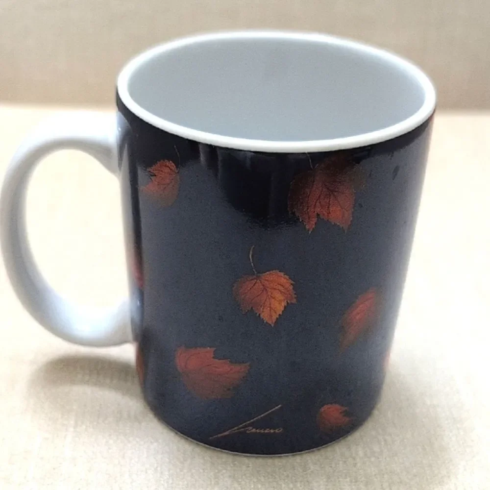 Vintage Catching Leaves Coffee Cat Mug By Lang & Wise Artwork by Lowell Herrero